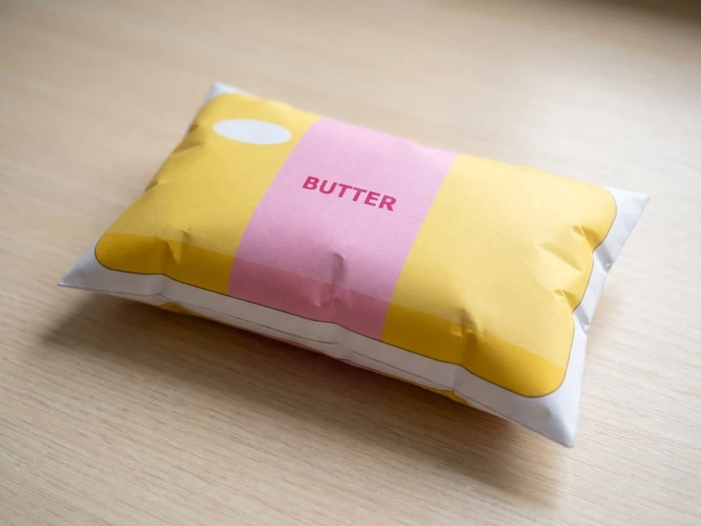 Как выглядит готовый сквиш масло butter из бумаги: жёлтый брусок с розовой обёрткой