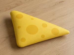 Фото большого сквиша сыр из бумаги: жёлтый клин с восемью дырками шириной 18 сантиметров